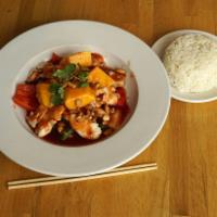 Pad Mango · Mango, bell peppers and onions stir-fried in special Thai sauce with cashews. Gluten-free. S...