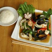 Seafood Basil · Stir-fried shrimp, squid and mussels with bell peppers and onions in homemade basil sauce. S...