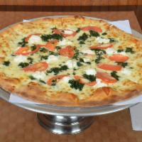 Florentine White Pizza · Ricotta, spinach, garlic and fresh tomato.