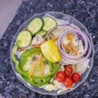 Garden Salad  · Iceburg lettuce, tomatoes, cucumber, green peppers, red onion, pepperoncini, carrots and red...