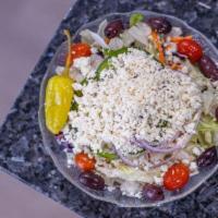 Greek Salad  · Garden with feta, Kalamata olives and Greek dressing.