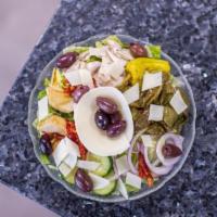 Agean Salad  · Romaine lettuce, cucumbers, red onions, mushrooms, artichoke hearts, sundried tomatoes, pepp...