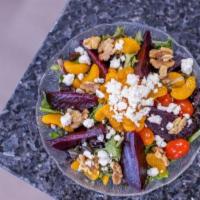 Roasted Beet Salad · Spring mix with roasted beets, mandarin oranges, fresh walnuts, goat cheese and grape tomato...