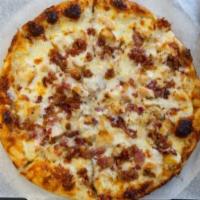 Chicken Bacon Ranch Pizza ·  No red sauce. Ranch dressing, bacon, grilled chicken and our mozzarella blend.