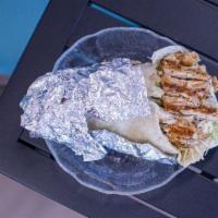 Chicken Caesar Wrap · Grilled Chicken, romaine lettuce, croutons, Parmesan cheese and Casear dressing
