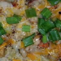 Shrimp and Crab Potato · Served with cheese. Includes fresh green onions.