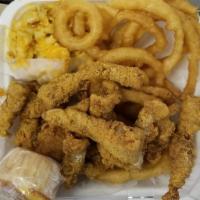 Catfish Dinner · Served with 2 sides. Includes dinner roll or corn muffin.
