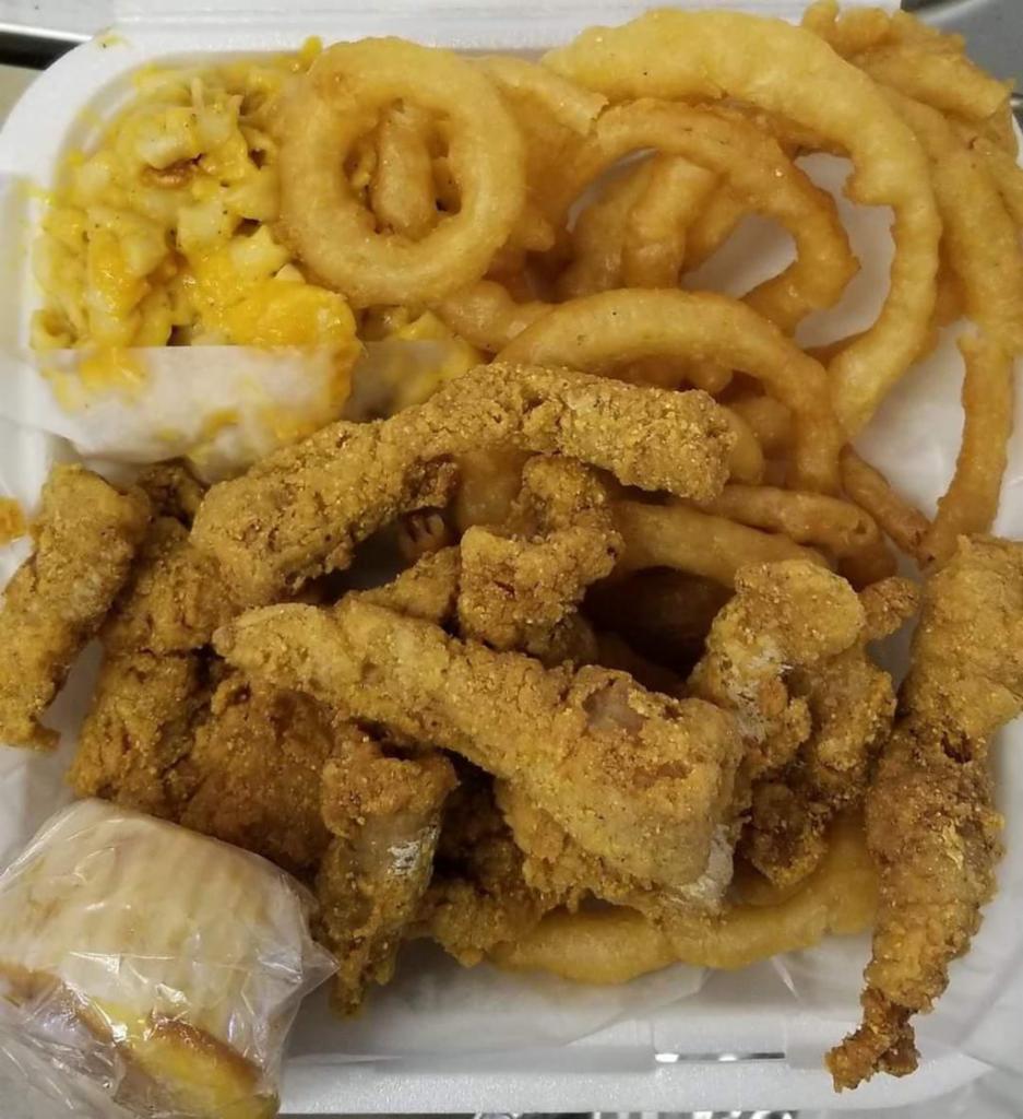 Catfish Dinner · Served with 2 sides. Includes dinner roll or corn muffin.