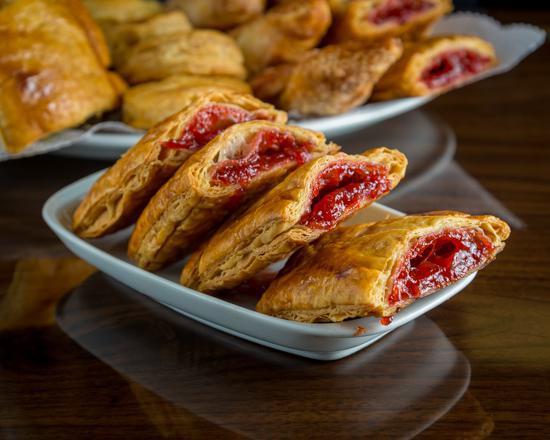 Pastelitos · Filled in soft and flaky sweet-glazed original recipe dough.