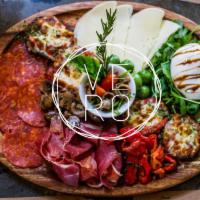 Our Antipasto Plate · with selection of cold cut Italian meats stone oven roasted vegetables
red bell peppers, ruc...