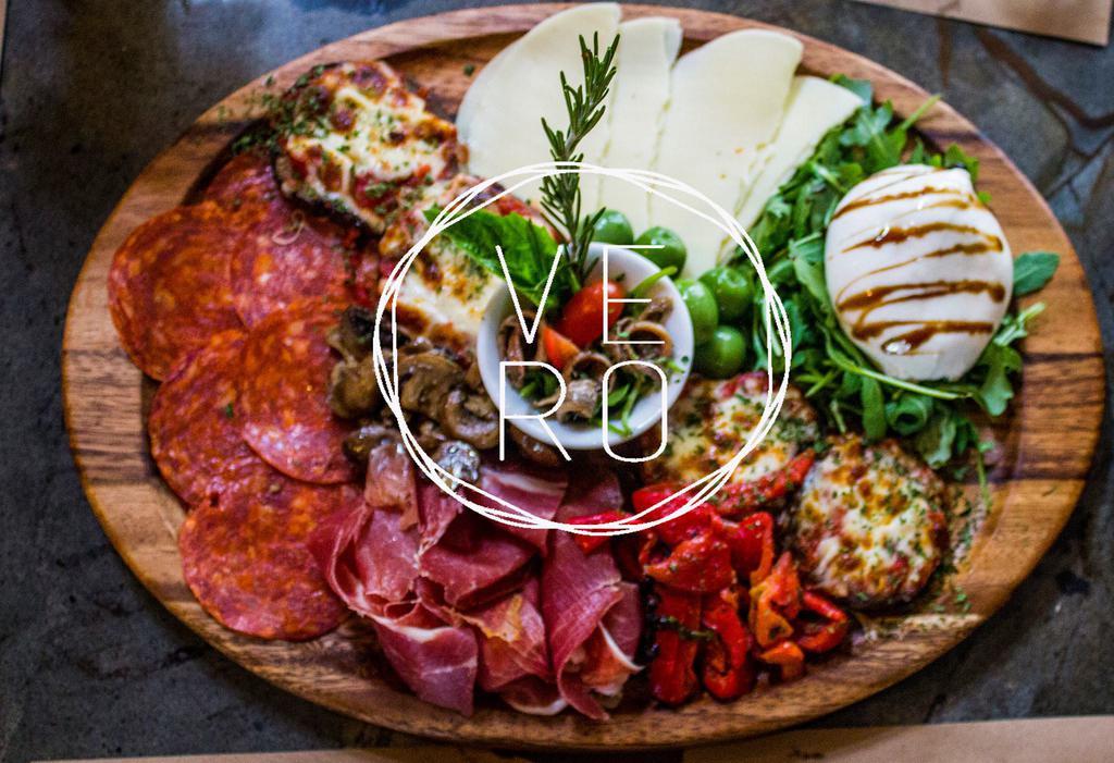 Our Antipasto Plate · with selection of cold cut Italian meats stone oven roasted vegetables
red bell peppers, rucola, crumble goat cheese,
roasted mushrooms, provolone cheese, with balsamic vinegar.