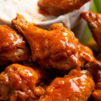 Buffalo Wings · Crispy and flavorful classic chicken wings with buffalo flavor packed sauce.