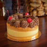 Boston Cream Cake · Gold cake filled with house made Italian bavarian cream and white mousse, topped with chocol...