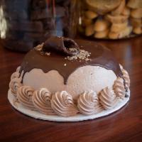 Chocolate Cannoli Cake · Chocolate cake filled with our famous chocolate cannoli filling, covered in chocolate Italia...