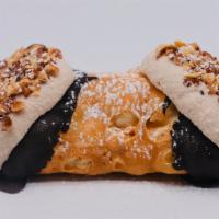 Hazelnut Cannoli  · Handmade shell  with chocolate drizzle, filled with fresh Ricotta Cheese and Hazelnut flavor...