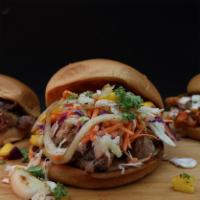 Build a Butt Sandwich · Comes with shredded smoked pork and your choice of 3 topping. Extra toppings and add meat fo...