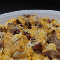 Mac and Cheese Butt Bowl  · Mac n cheese topped with smoked shredded pork drizzled with house-made sauce and topped with...