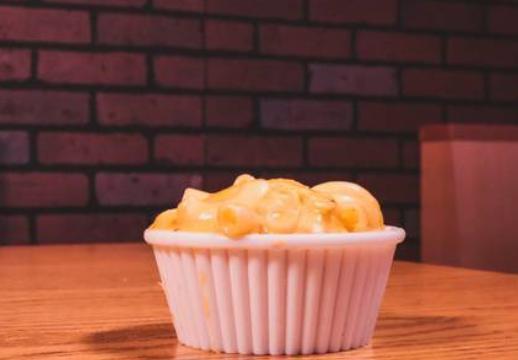 Mac in Cheese · Macaroni pasta in a cheese sauce.