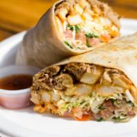 Chef's California Burrito · Flour tortilla, carnitas, chipotle aioli pork belly, guacamole, pico de gallo, coleslaw and ...
