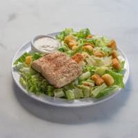 Grilled Salmon Caesar Salad · Grilled salmon over Caesar.