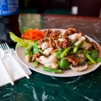 Honey Glazed Walnuts of 3 Delights · Jumbo shrimp and chicken sauteed with pea pods, baby corn, water chestnuts, broccoli and mus...
