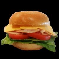 SUB SANDWICH TURKEY BREAST OR ROASTED CHICKEN · TURKEY BREAST OR ROASTED CHICKEN ON A BRIOCHE BUN ON A BED OF ARUGULA, TOMATOES, AND CHEESE