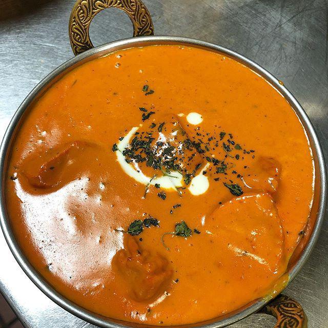 Chicken Tikka Masala · Boneless chicken marinated and cooked in the tandoor and sauteed with tomato based sauce. Served with basmati rice.