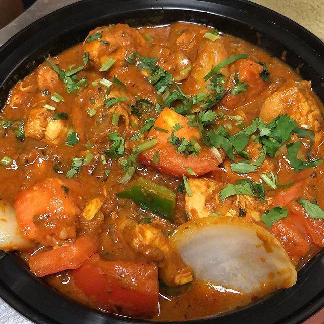 Chicken Karahi · Succulent boneless chicken cooked with tomatoes, onions, green peppers, ginger, garlic, and cilantro. Served with basmati rice