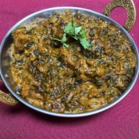 Lamb Saag · Boneless lamb cubes cooked in spinach based curried sauce with a touch of cream. Served with...