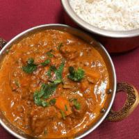 Lamb Rogan Josh · Tender boneless lamb cooked with spices and diced tomato. Served with basmati rice.
