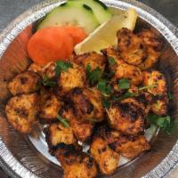Chicken Sekewa · Skewered chicken marinated in a blend of Himalayan herbs and spices.
