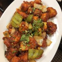 Chicken Chili · Boneless chicken deep fried and sauteed with green chillies, onions, ginger, garlic and sauc...