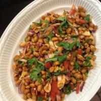 Bhatmas Sadeko · Fried soybean mixed with onions, tomato, cilantro, green chilies, and Nepali spices.