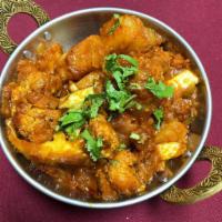 Aloo Gobi · Potatoes and cauliflower tossed with fresh ginger, garlic and spices. Served with basmati ri...