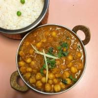 Chana Masala · Chick peas cooked in spices. Served with basmati rice.