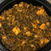 Chana Saag (paneer not included) · Chickpeas cooked with garden-fresh spinach and spiced with a touch of cream. Served with bas...