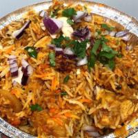 Chicken Biryani  · Basmati rice flavored with saffron, cooked with mildly spiced chicken in an aromatic combina...