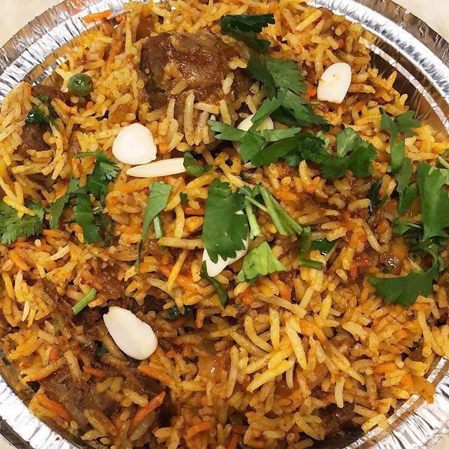 Lamb Biryani · Boneless lamb cubes cooked with nuts, onions, ginger, cilantro and exotic spices with basmati rice and nuts. Served with cucumber raita.