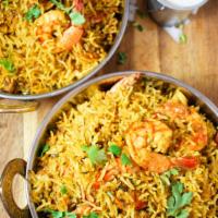 Shrimp Biryani · Marinated shrimp, onions, garlic, ginger, cilantro, herbs, nuts, spices and cooked with basm...