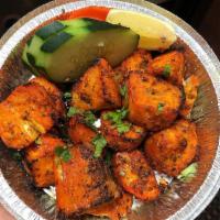 Chicken Tikka · Boneless chicken pieces marinated with spices and grilled to perfection in the tandoor. No r...