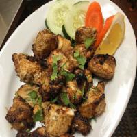 Malai Kabab · Boneless chicken breast pieces marinated with cream cheese, spices and cooked in tandoor. No...