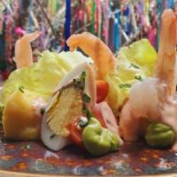Causa Cocktail (Copy) · Whipped Idaho potato topped with steamed shrimp, avocado and tomatoes tossed with cocktail s...