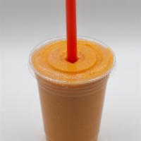 The Energizer Smoothie · Mango, Orange, Carrot, Apple, Almond Milk, Honey, and Ginger.