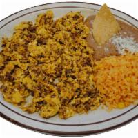 Huevos con Chorizo Breakfast · Scrambled eggs with Mexican sausage. Served with rice and beans