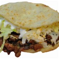 Carne Asada gordita · Grilled steak. Served with a thick corn tortilla with lettuce, sour cream and cheese.