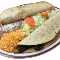 Quesadilla Dinner · 2 quesadillas served with side salad, rice and beans. Served with rice, beans, salad and tor...