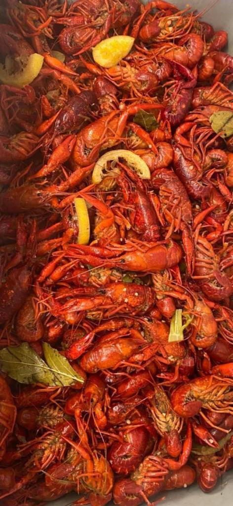 Crawfish By the pound  · 1 lb (market price currently $6.29/ pound) Now serving fresh hot boiled local/Louisiana crawfish by the pound. MILD SPICY boiled with high quality ingredients; fresh oranges, fresh celery, fresh lemons, bay leaves, seasonings & more. lots of flavor!! add a side of corn or potatoes under our sides 