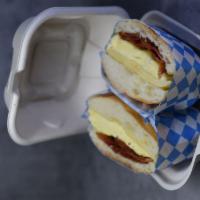 Bacon Egg N cheese · Chewy, crispy bacon with egg, your choice of cheese on our house made toasted ciabatta roll