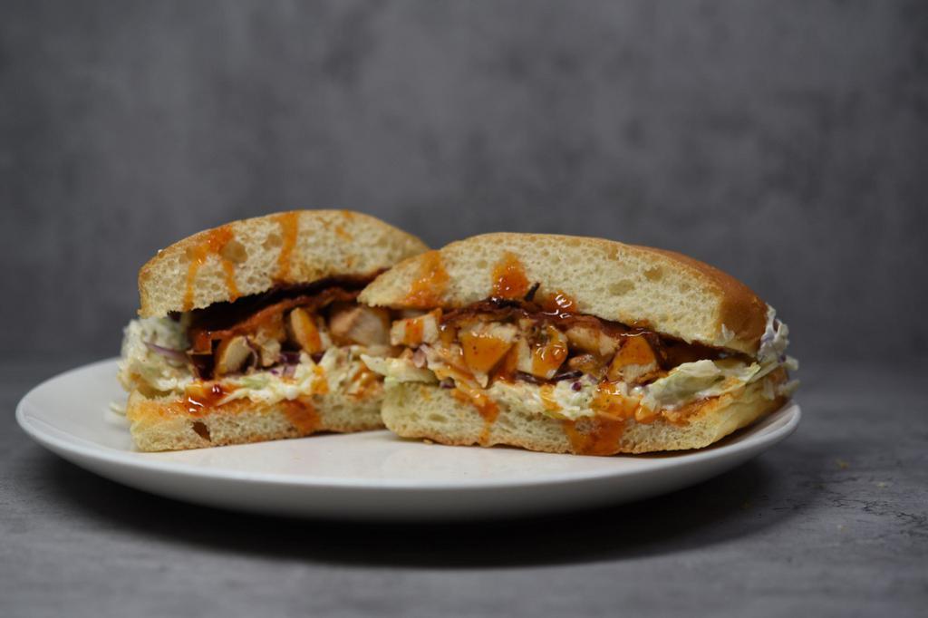 BBQ Chicken Down South without Twists (BCDS) · Marinated chicken breast, cheddar cheese bacon with a mango BBQ glaze served with a zesty slaw on ciabatta.
