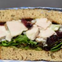 Classic Napa Chicken Salad Sandwich · Marinated chicken with a lemon aioli sauce with savory sunflower seeds, juicy cranberries an...
